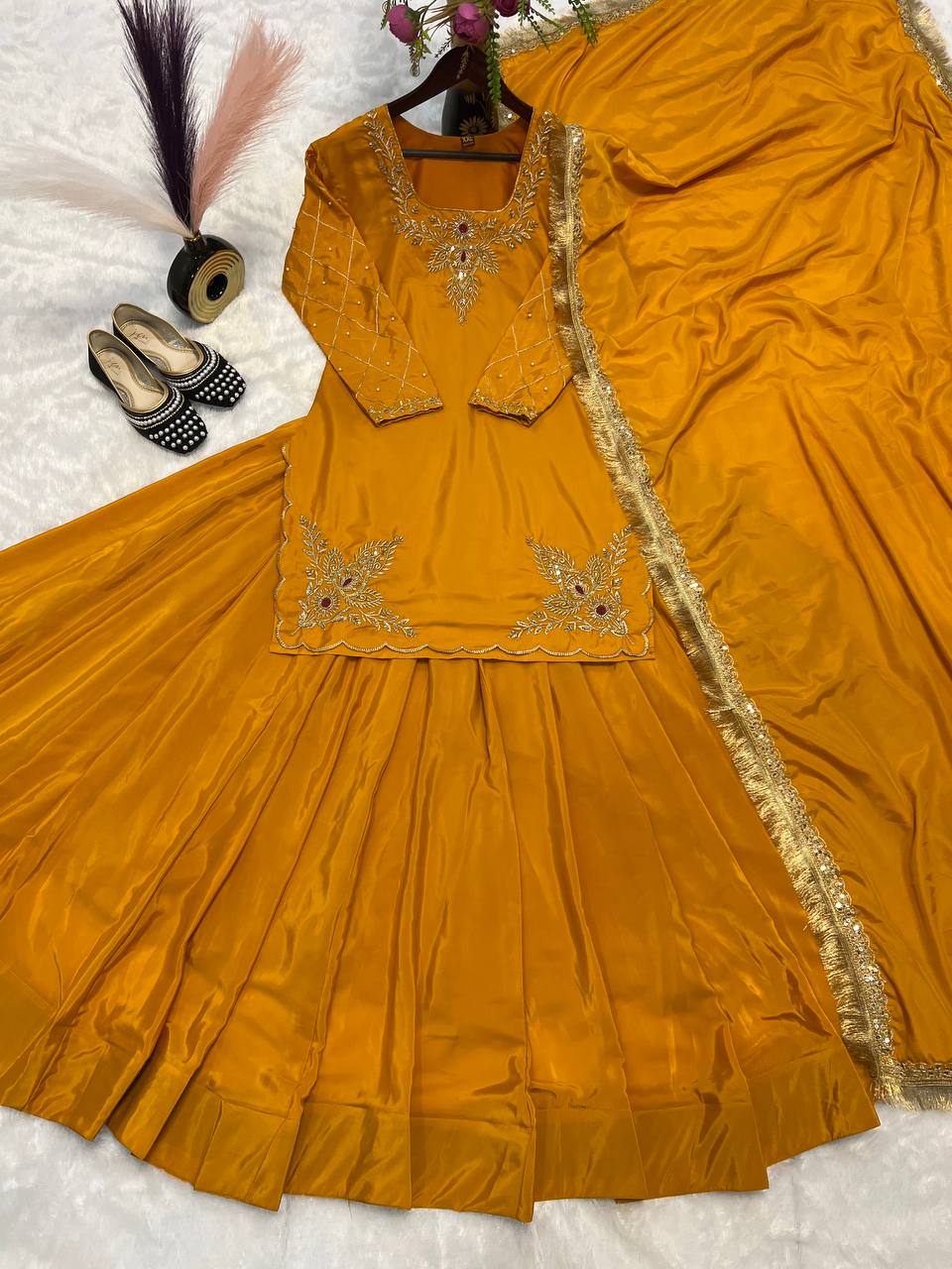 Three-piece  full-sleeve top, lehenga, and dupatta