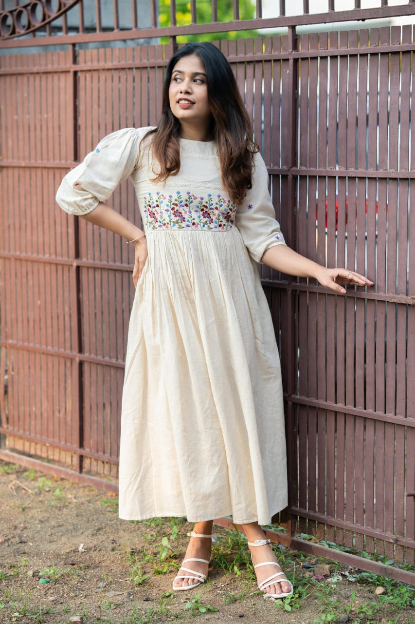 Off-white dress with floral embroidery 