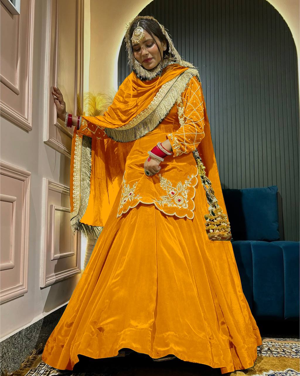 Three-piece  full-sleeve top, lehenga, and dupatta