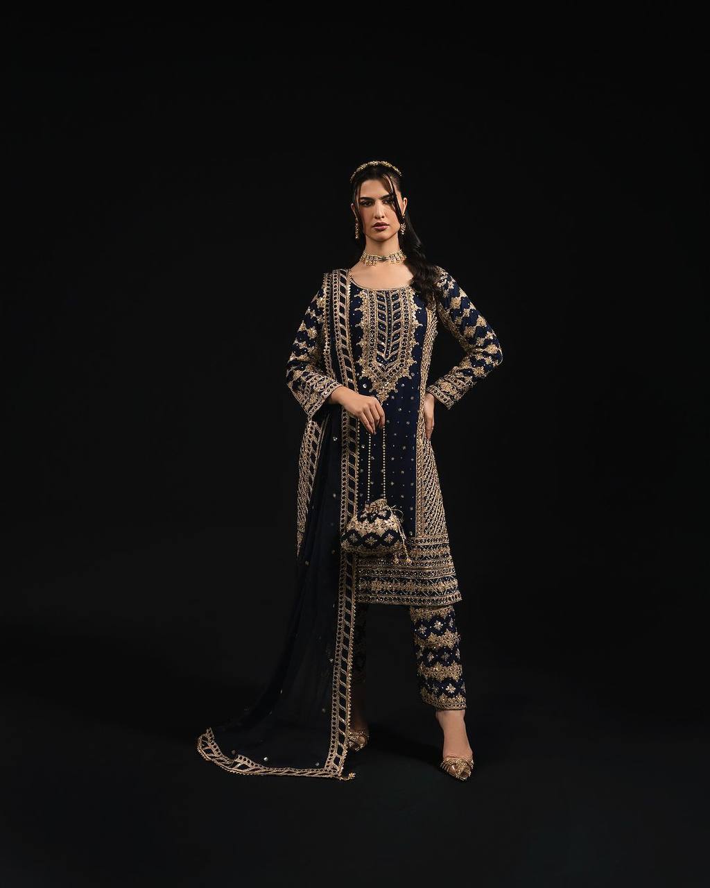 Three-piece ensemble featuring a faux georgette top pent with dupatta