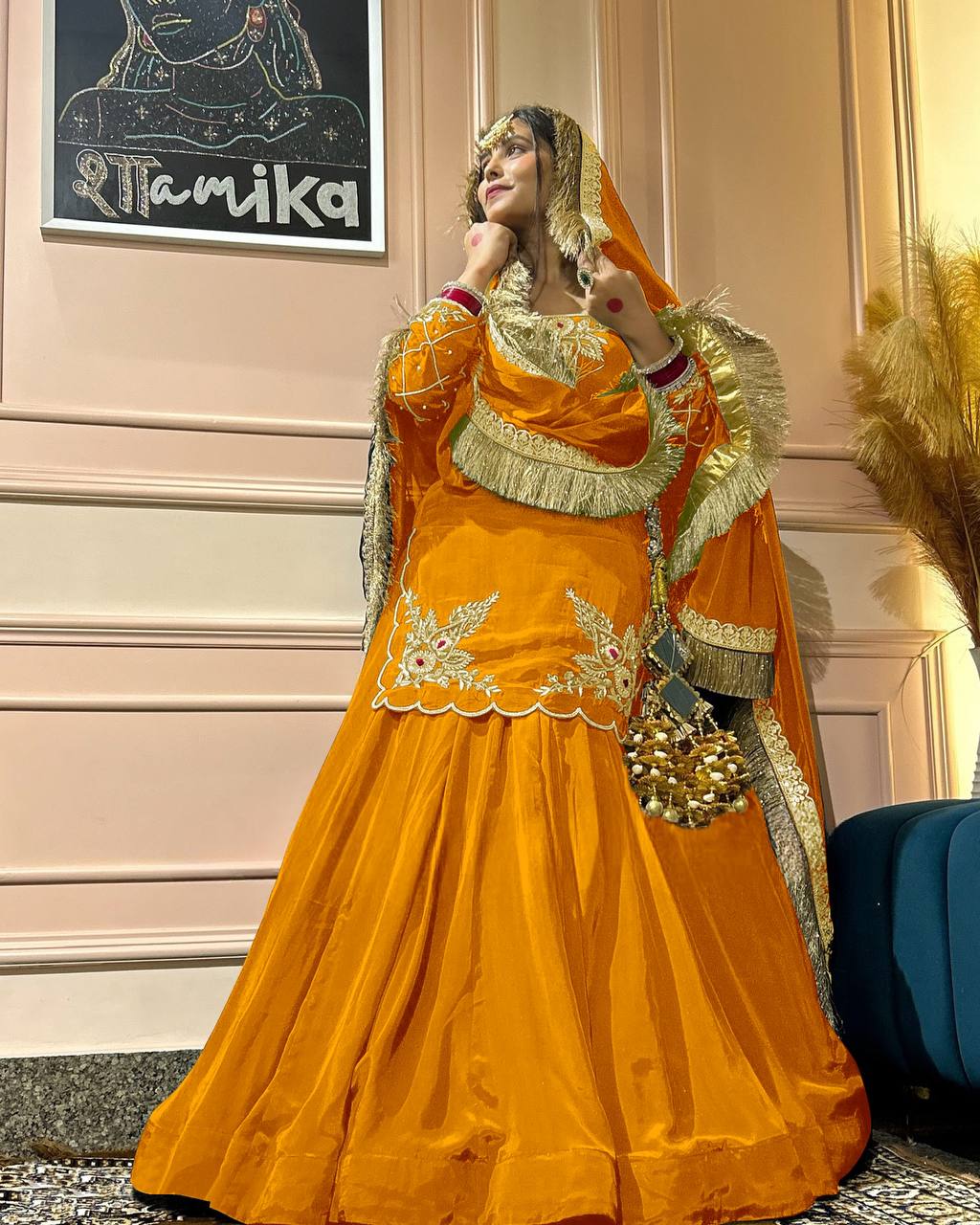 Three-piece  full-sleeve top, lehenga, and dupatta